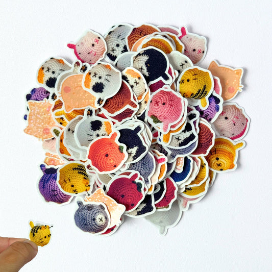 Collection of colorful cat-themed stickers on a white background with text indicating price and event information.